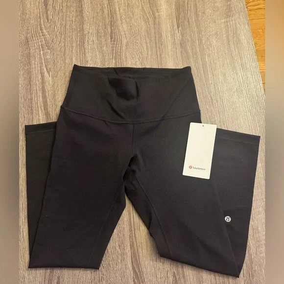 New with tags Lululemon Wunder Train High-Rise Ribbed
Tight 25", Black. Size 6. - Picture 12 of 15